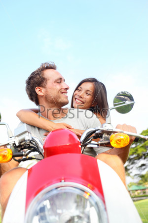 Couple driving scooter in love