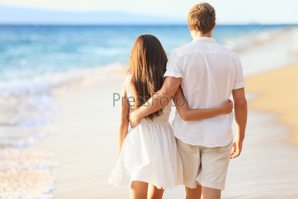 Vacation Couple Walking on Beach