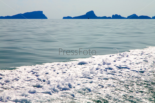 asia myanmar kho phangan bay isle froth foam  sun beam in thailand and south china sea