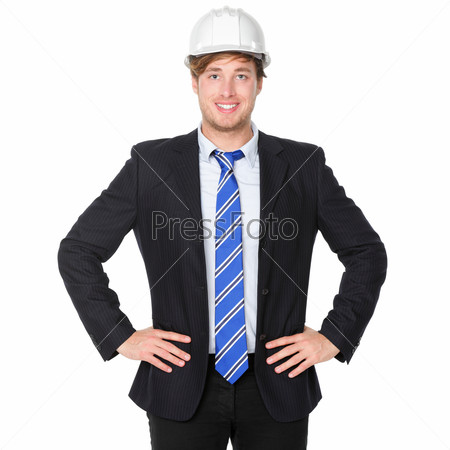 Engineer or architect business man in suit. Male businessman wearing white hard hat helmet smiling happy, proud and confident. Portrait of young male engineer in his 20s isolated on white background.