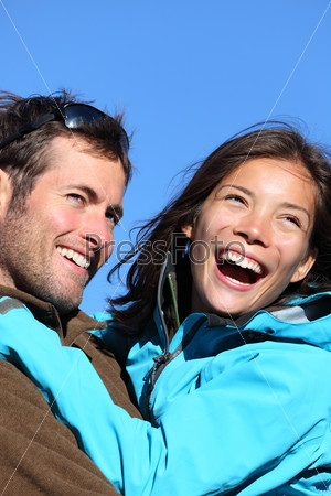 Happy young couple active outdoors