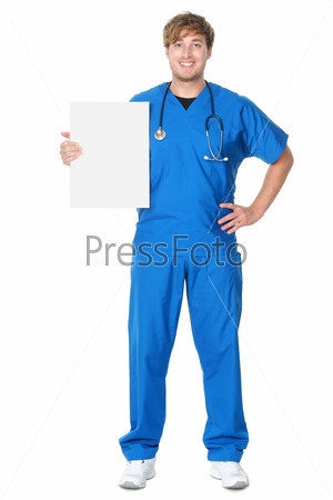 Male doctor / nurse showing billboard sign. Young medical professional wearing blue scrubs and stethoscope standing in full body isolated on white background.