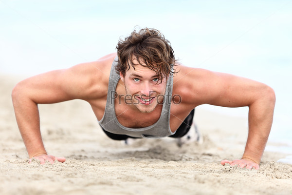 Fitness man exercising push ups