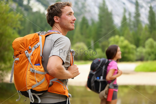 Hikers - hiking, man looking in Yosemite