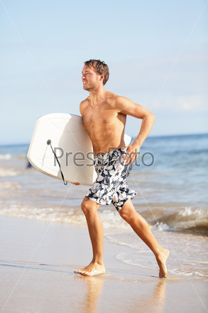 Beach water sports surfing man with body surfboard