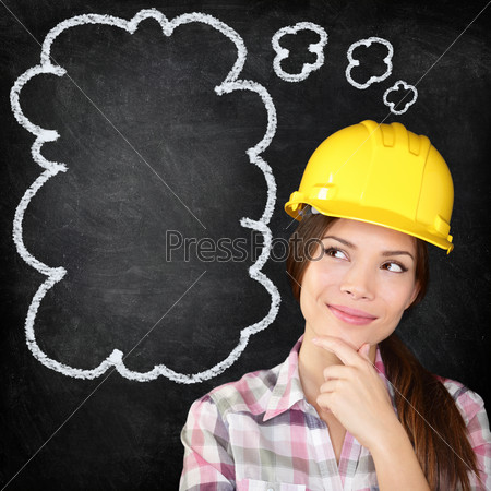 Thinking construction worker girl on chalkboard