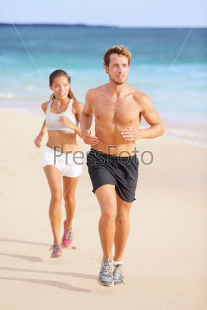 Couple running - man fitness runner first