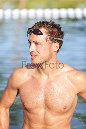 Swimming man portrait - handsome male swimmer