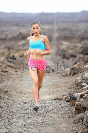 Healthy lifestyle runner woman trail running