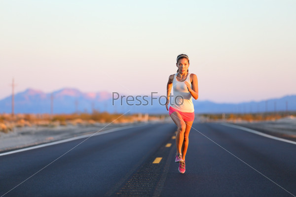 Running woman sprinting on road highway