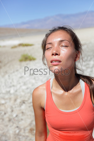 Thirst - dehydrated thirsty woman sweating desert