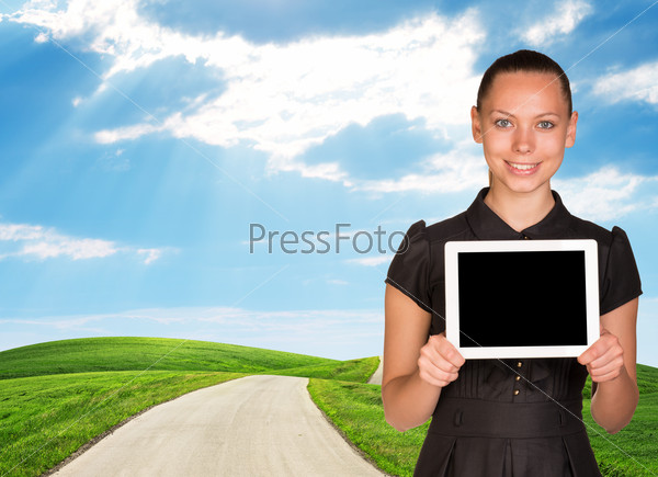 Young woman and landscape under blue sky with road