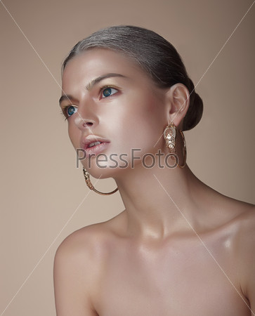 Portrait of Gorgeous Woman with Earrings