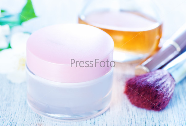 Cream for body in bank and on a table, stock photo