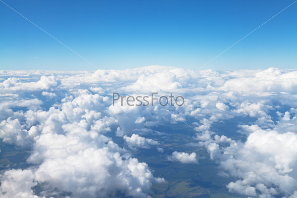 above view of white clouds in blue sky and lands under clouds