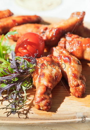 Barbecue grilled chicken wings close up