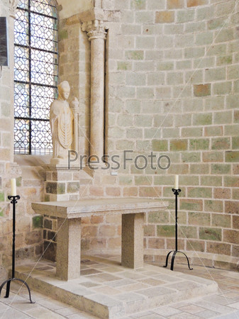 MONT SAINT-MICHEL, FRANCE - AUGUST 9, 2014: statue in Church-abbey of Mont Saint Michel. The abbey has been protected as a French monument historique from 1862
