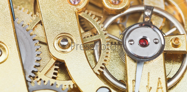 brass mechanical movement of vintage watch close up
