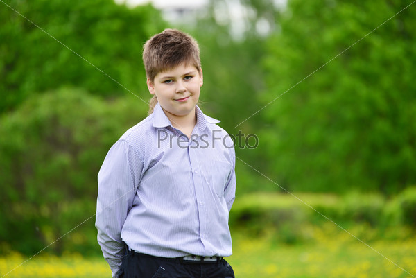 teenager Boy in the spring park