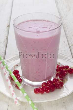 cold red currant milk shake in a glass
