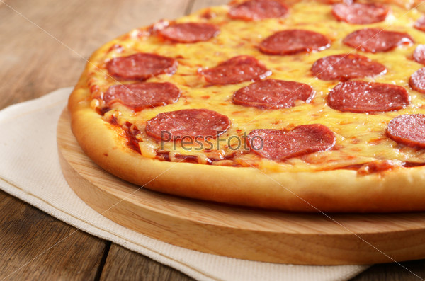 Pepperoni pizza  on the kitchen table