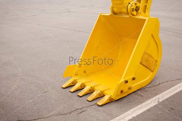 Construction concept with bucket, selective focus, stock photo