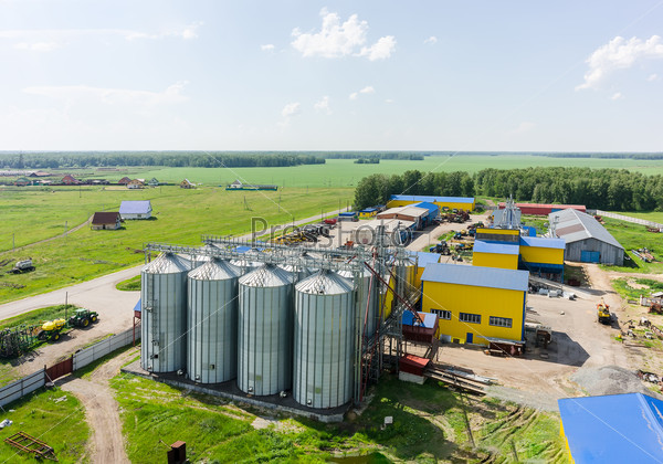 Novikova, Russia - June 18, 2015: Aerial view onto modern machine yard of agricultural firm \