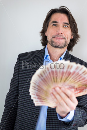 man with Russian money in hands