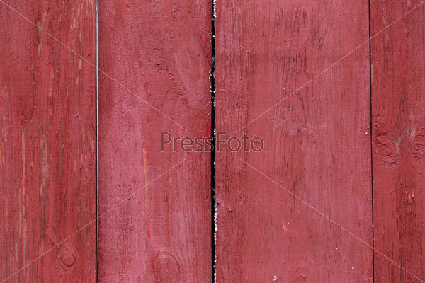 texture of the table from boards painted with red paint