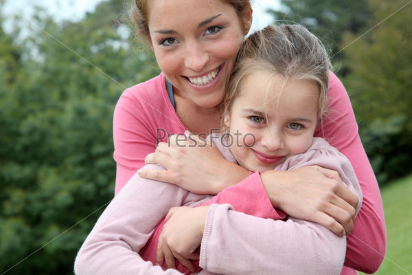 Portrait of mother and daughter, stock photo