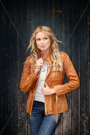 Portrait of beautiful blond woman with leather jacket