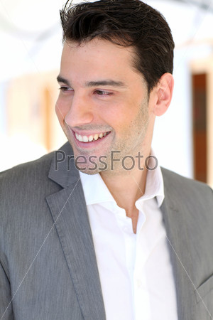 Portrait of young relaxed businessman