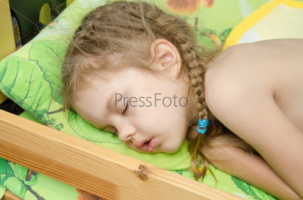 Five-year girl Europeans sweetly asleep in bed