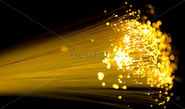 Yellow fiber optics cable close up shot, stock photo