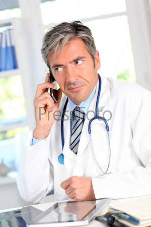 Portrait of medical people using electronic tablet