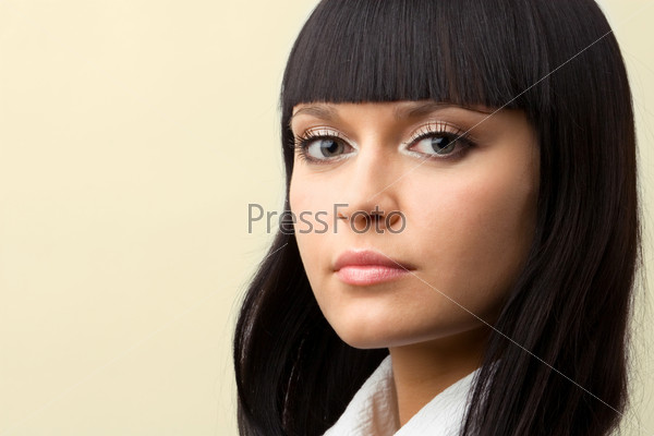 Portrait of confident brunette woman with copyspace, stock photo
