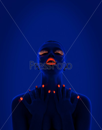 close-up portrait of young woman wearing UV lashes and lipstick under blacklight