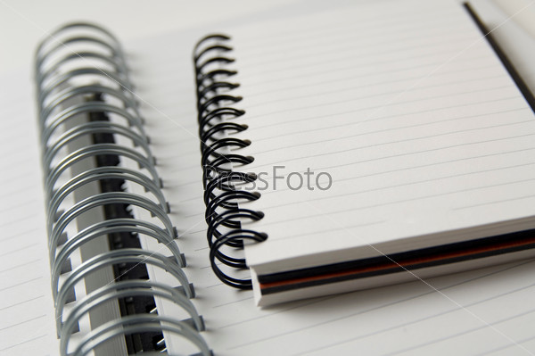 Opened blank coiled note pads
