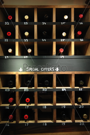 wine rack showing bottles on special offer