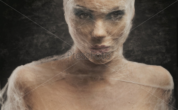 Fine art portrait of a young woman in bandage