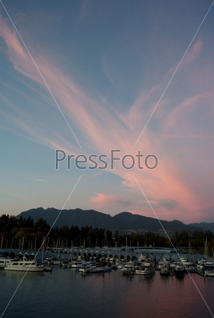 Sunset skyline and boats docked in Vancouver, British Columbia, Canada