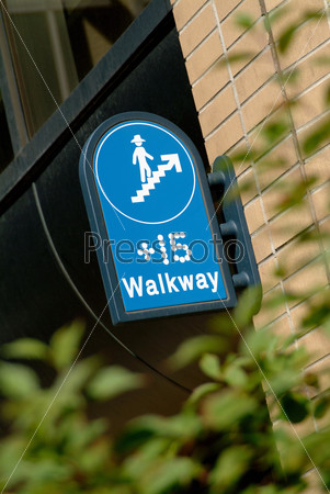 Plus 15 walkway sign on the wall