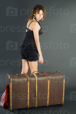 Beautiful girl with suitcase