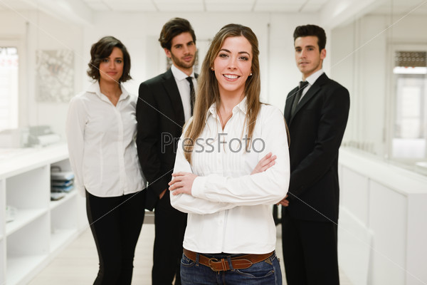 Image of businesswoman leader looking at camera in working environment