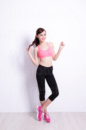 Sport Woman with health figure with white wall background, great for your design or text, asian beauty