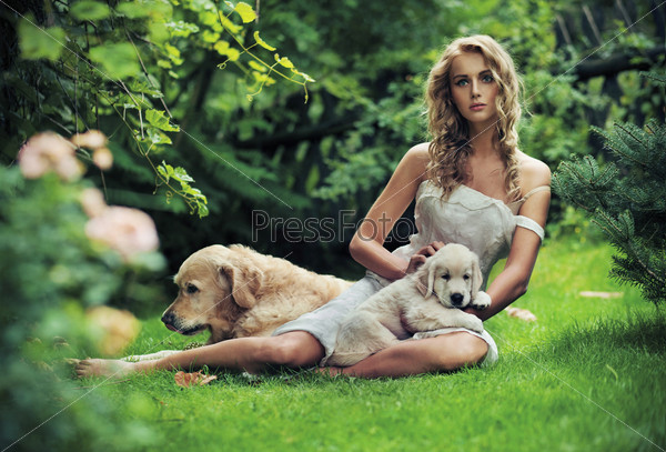 Cute woman with dogs in beauty nature scenery