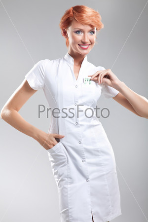 Nice nurse showing pills (sexy, nurse, doctor)