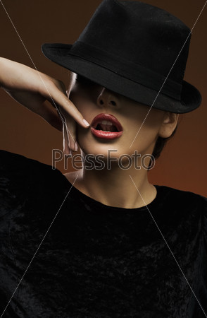Elegant sexy lady wearing hat