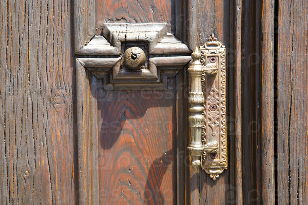 abstract  house door    in italy   lombardy   column  the milano old        closed nail rusty
