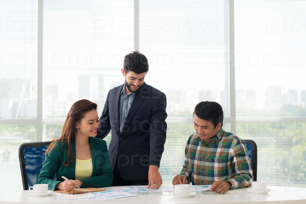 Business team working with papers in the office